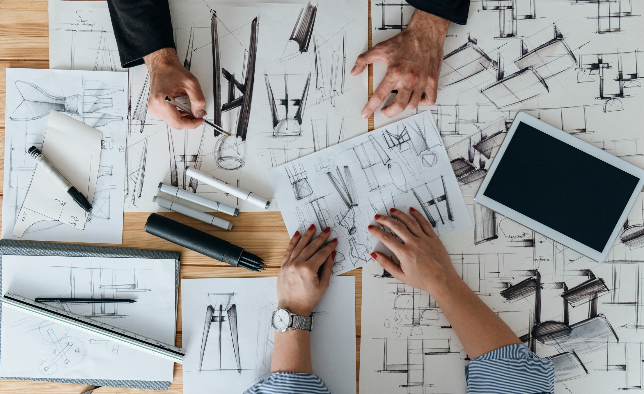 Table Top View of Furniture Designer Team Hands Drawing Blueprint Design for Handmade Flower Pots